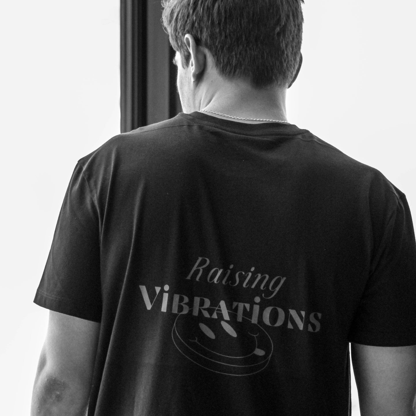 ¨Raising vibrations¨Unisex Tshirt